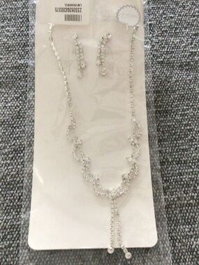 NWT pierced rhinestone earrings and necklace set